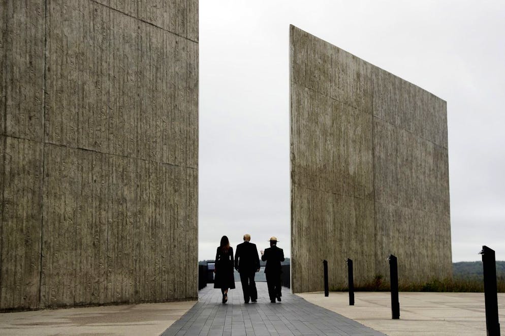 President Donald Trump and first lady Melania Trump, escorted by Stephen Clark, Superintendent of the National Parks of Western Pennsylvania, walk along the September 11th Flight 93 memorial, Tuesday, Sept. 11, 2018, in Shanksville, Pa., escorted by (AP Photo/Evan Vucci)