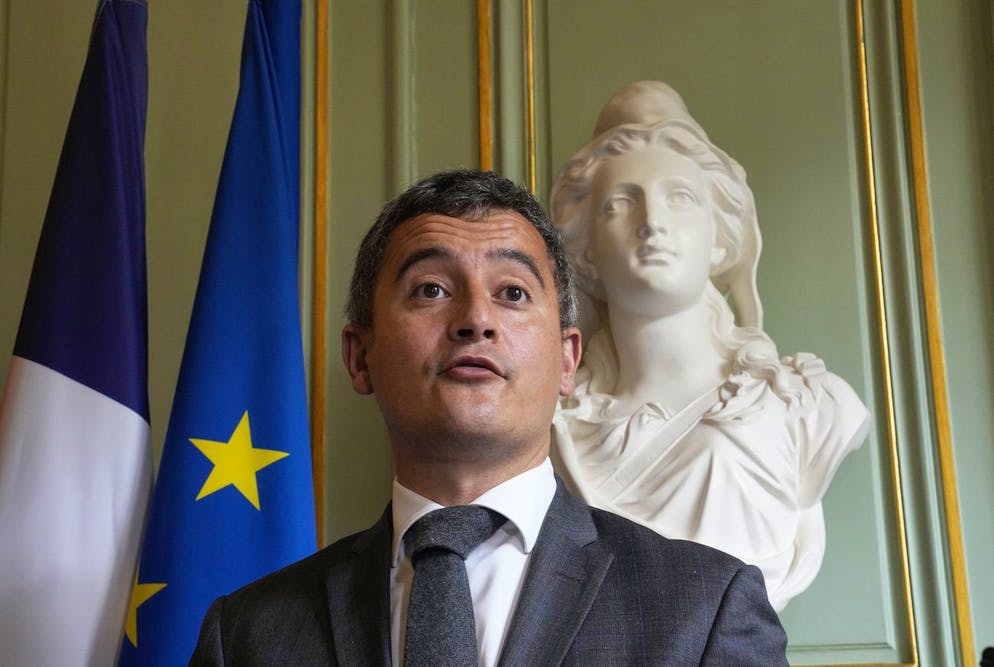 French Interior Minister Gerald Darmanin gestures as she speaks during a joint media conference with Switzerland's Justice Minister Karin Keller-Sutter after a meeting at the Interior Ministry in Paris, Tuesday, May 25, 2021. (AP Photo/Michel Euler)7