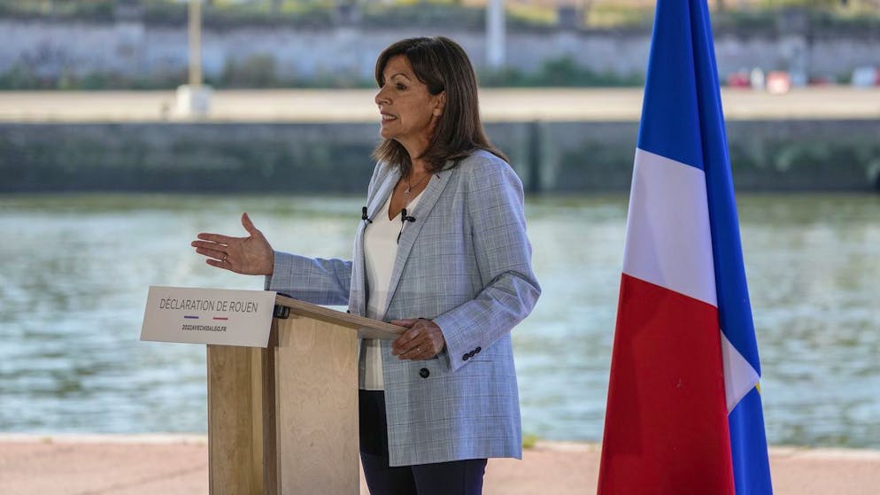 Socialist mayor of Paris Anne Hidalgo gestures as she announced her candidacy for the upcoming presidential election in France next year during a meeting in Rouen, Normandy, Sunday, Sept. 12, 2021. French far right leader Marine Le Pen hands over the reins of her party to focus on her campaign for the April presidential election, and the Socialist mayor of Paris declares she is joining the 2022 race. (AP Photo/Michel Euler)