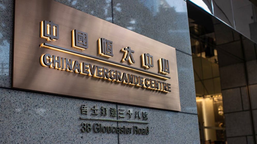epa09469323 Signage for China Evergrande Centre is displayed at the building's entrance in Hong Kong, China, 15 September 2021. Chinese property developer Evergrande said on 14 September that its property sales will likely continue to drop significantly in September, resulting in a further deterioration of its cash situation, according to media reports. EPA/JEROME FAVRE