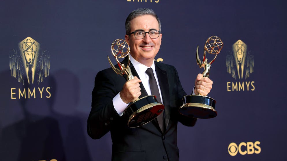 LOS ANGELES, CALIFORNIA - SEPTEMBER 19: John Oliver, winner of the Outstanding Variety Talk Series and Outstanding Writing for a Variety Series awards for ‘Last Week Tonight with John Oliver,’ poses in the press room during the 73rd Primetime Emmy Awards at L.A. LIVE on September 19, 2021 in Los Angeles, California. (Photo by Rich Fury/Getty Images)