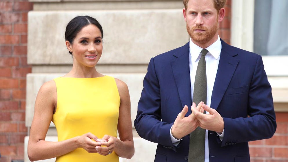 ARCHIV - Prinz Harry von Großbritannien und seine Frau Meghan während des Empfangs "Dein Commonwealth-Herausforderung für die Jugend" im Marlborough House. Foto: Yui Mok/PA Wire/dpa