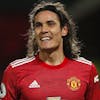 Manchester United's Edinson Cavani smiles after coming on as substitute during an English Premier League soccer match between Manchester United and Leeds United at the Old Trafford stadium in Manchester, England, Sunday Dec. 20, 2020. (Clive Brunskill/Pool via AP)