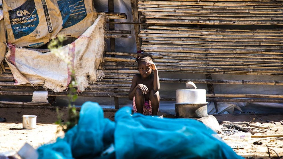 epa08560085 A child from the Vicente Tiago family of 30 people who fled the armed attacks in Muidumbe, Cabo Delgado, and took refuge in a small precarious house in Chiuba, Pemba City, Cabo Delgado province, Mozambique, 21 July 2020 (issued 22 July 2020). He is one of thousands of families in need of food aid in the humanitarian crisis affecting the northern province of Mozambique. EPA/RICARDO FRANCO