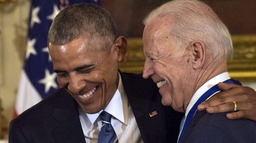 President Barack Obama laughs with Vice President Joe Biden during a ceremony in the State Dining Room of the White House in Washington, Thursday, Jan. 12, 2017. Obama presented Biden with the Presidential Medal of Freedom. (AP Photo/Susan Walsh)
