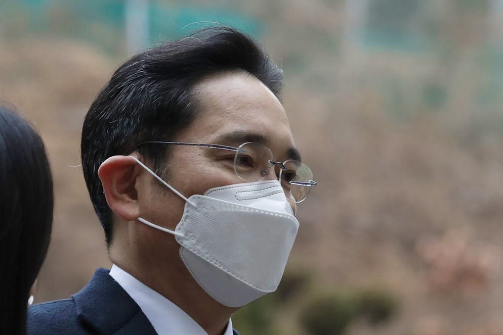 Samsung Electronics Vice Chairman Lee Jae-yong arrives at the Seoul High Court in Seoul, South Korea, Monday, Jan. 18, 2021. Lee was sent back to prison on Monday after a South Korean court sentenced him to two and a half years over his involvement in a 2016 corruption scandal that spurred massive street protests and ousted South KoreaâÄ™s then-president. (AP Photo/Lee Jin-man)