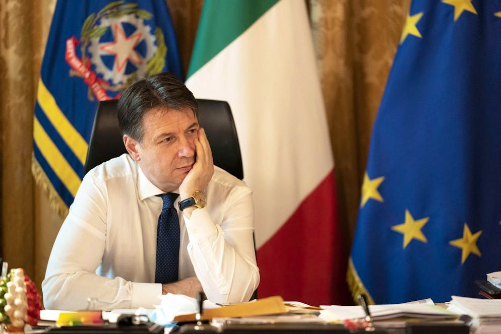epa08966944 A handout photo made available by Chigi Palace Press Office shows Italian resigned Prime Minister Giuseppe Conte in his office at Chigi Palace, Rome, 26 January 2021. Conte's coalition government, which has been in power since September 2019, was plunged into turmoil by the withdrawal last week of former premier Matteo Renzi's Italia Viva party. Media reports suggest Conte will seek a new mandate to form a new government to run Italy as it battles the coronavirus pandemic, which has left more than 85,000 people dead in the country and crippled the economy. EPA/FILIPPO ATTILI / CHIGI PALACE PRESS OFFICE / HANDOUT HANDOUT EDITORIAL USE ONLY/NO SALES