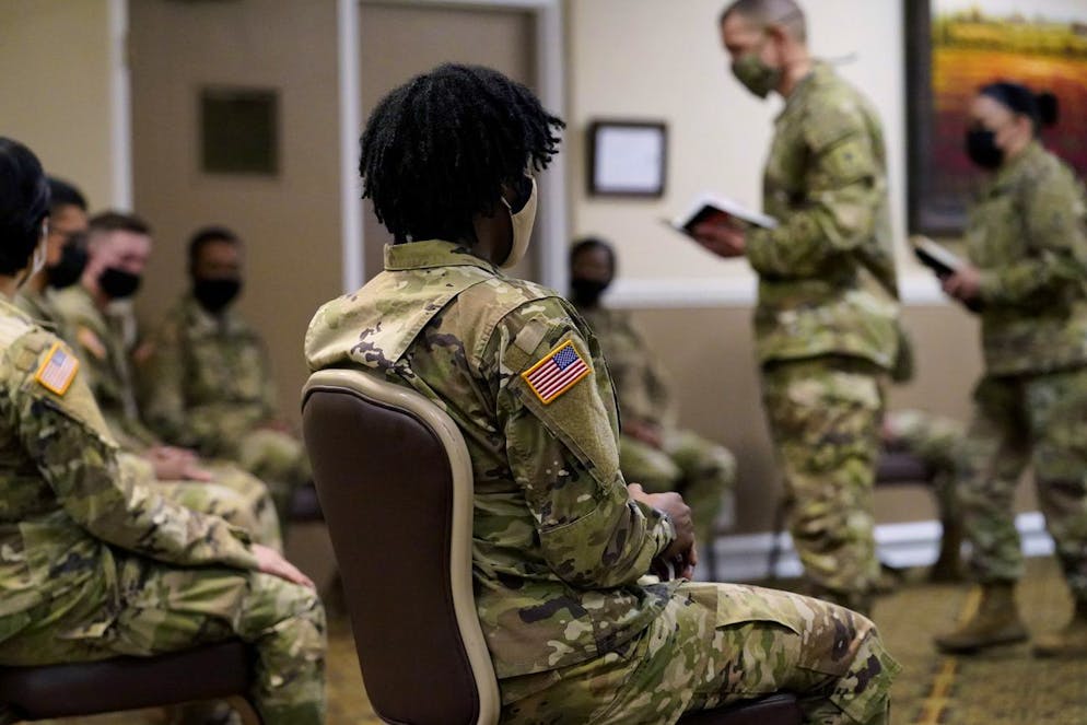 Soldiers give feedback to Sergeant Major of the Army Michael Grinston, second from right, and Sgt. Maj. Julie Guerra, People First Task Force, right, about their concerns at Fort Hood, Texas, Thursday, Jan. 7, 2021. Following more than two dozen soldier deaths in 2020, including multiple homicides, the U.S. Army Base is facing an issue of distrust among soldiers. (AP Photo/Eric Gay)