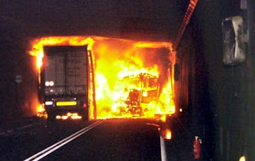 This Police handout picture shows the accident site in the Gotthard tunnel, shortly after the fire broked out, Wednesday, October 24, 2001. At least ten people were killed in a head-on truck crash and fire in a major Alpine tunnel, but officials said safety features prevented a much worse disaster. (KEYSTONE/POLICE CANTONAL TESSIN/Str) === ===