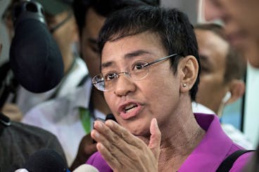 CEO of Philippine news website Rappler, Maria Ressa, gestures as she speaks to the media as she arrives at the National Bureau of Investigation (NBI) headquarters in Manila on January 22, 2018.
The head of a news website threatened with closure by the government appeared before state investigators on January 22 over a defamation complaint which she decried as part of President Rodrigo Duterte's concerted attack on press freedom. / AFP PHOTO / NOEL CELIS        (Photo credit should read NOEL CELIS/AFP via Getty Images)