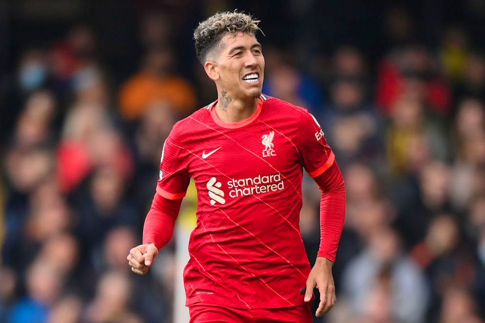 WATFORD, ENGLAND - OCTOBER 16: Roberto Firmino of Liverpool celebrates after scoring their side's third goal during the Premier League match between Watford and Liverpool at Vicarage Road on October 16, 2021 in Watford, England. (Photo by Justin Setterfield/Getty Images)