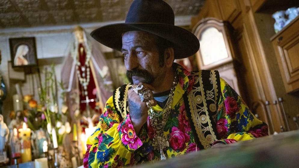 Zoltan Sztojka, traditional Gypsy fortune-teller is seen in his home in Soltvadkert, central Hungary on Oct. 10, 2021. Sztojka, by his own account HungaryâÄ™s last Roma fortuneteller, is working to preserve his culture's traditions that are slowly vanishing in the Central European country. (AP Photo/Bela Szandelszky)