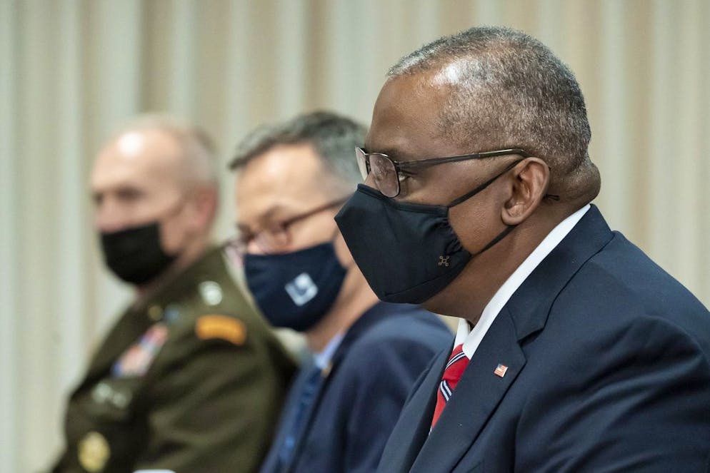 Secretary of Defense Lloyd Austin, right, is seated for a meeting with Poland's Minister of National Defense Mariusz Blaszczak, at the Pentagon, Wednesday, Oct. 6, 2021, in Washington. (AP Photo/Alex Brandon)
