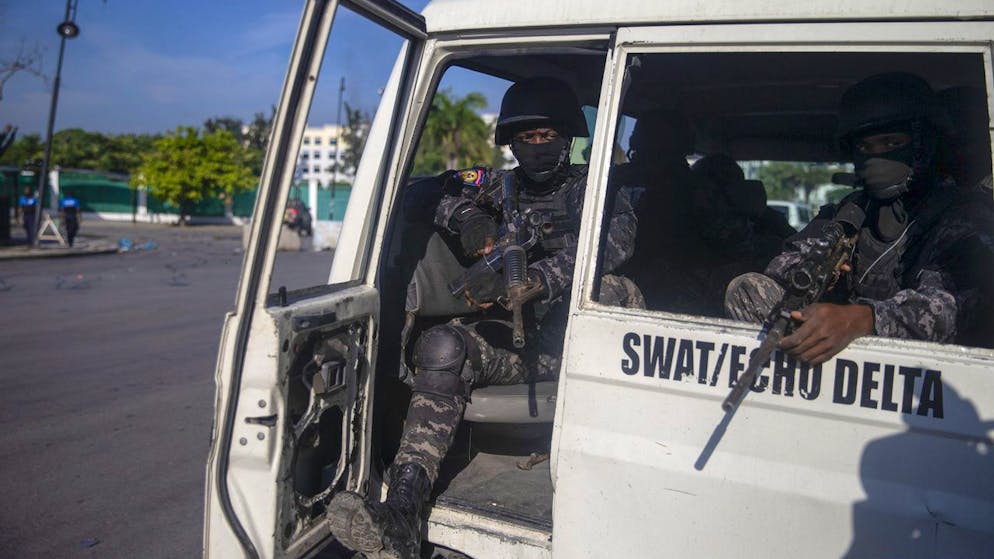 Armed forces secure the area where the Haiti's Prime Minister Ariel Henry placed a bouquet of flowers in front of independence hero Jean Jacques Dessalines memorial in Port-au-Prince, Haiti, Sunday, Oct. 17, 2021. A group of 17 U.S. missionaries including children was kidnapped by a gang in Haiti on Saturday, Oct. 16, according to a voice message sent to various religious missions by an organization with direct knowledge of the incident. (AP Photo/Joseph Odelyn)