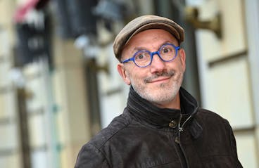14 October 2021, Berlin: French comic book author Jean-Yves Ferri stands at a press event in Paris Square. This Thursday sees the publication of the new volume
