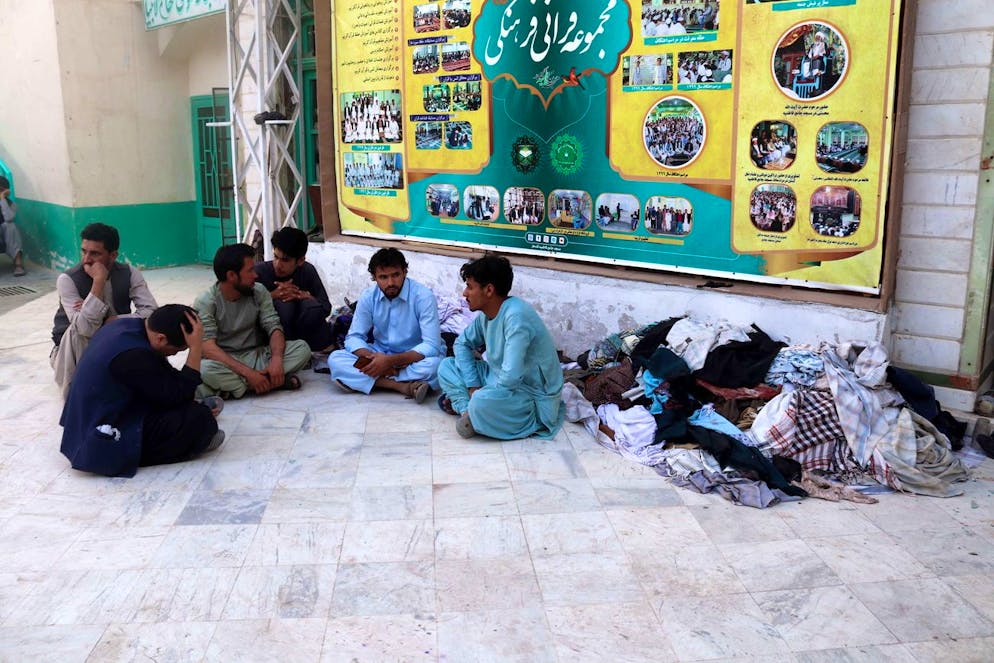 epa09525440 People inspect the scene of a bomb blasts during Friday congregational prayers at Shi'ite Muslims Mosque in Kandahar, Afghanistan, 15 October 2021. At least 32 worshipers died, and many others suffered injuries in a powerful explosion that ripped through a Shia mosque in the southern Afghan city of Kandahar during Friday prayers, officials said. The Islamic State has carried out numerous attacks, in recent years, against the Shia minority, especially the Hazaras. The Taliban have launched massive operations against the Islamic State in different Afghan provinces, aiming to finish a group that they consider the main threat to their government. EPA/STRINGER