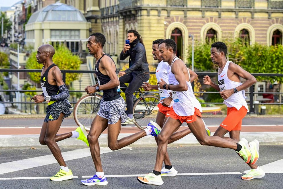 epa09528208 The leading group during the TCS Amsterdam Marathon, in Amsterdam, the Netherlands, 17 October 2021. The 45th edition was postponed for a year due to the coronavirus pandemic. EPA/Olaf Kraak