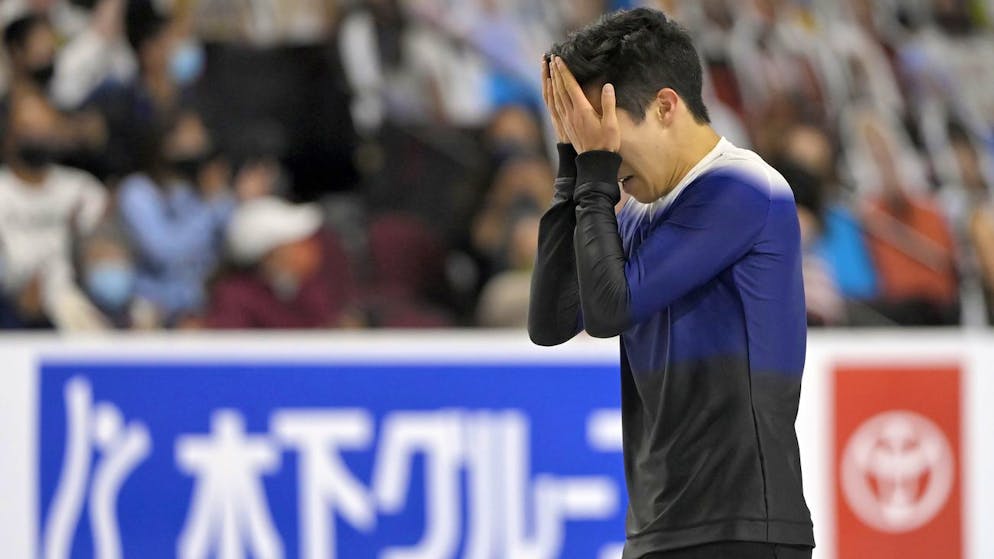 Nathan Chen of the U.S., reacts at the end of his performance in the men's free skate program at the Skate America figure skating event Saturday, Oct. 23, 2021, in Las Vegas. (AP Photo/David Becker)