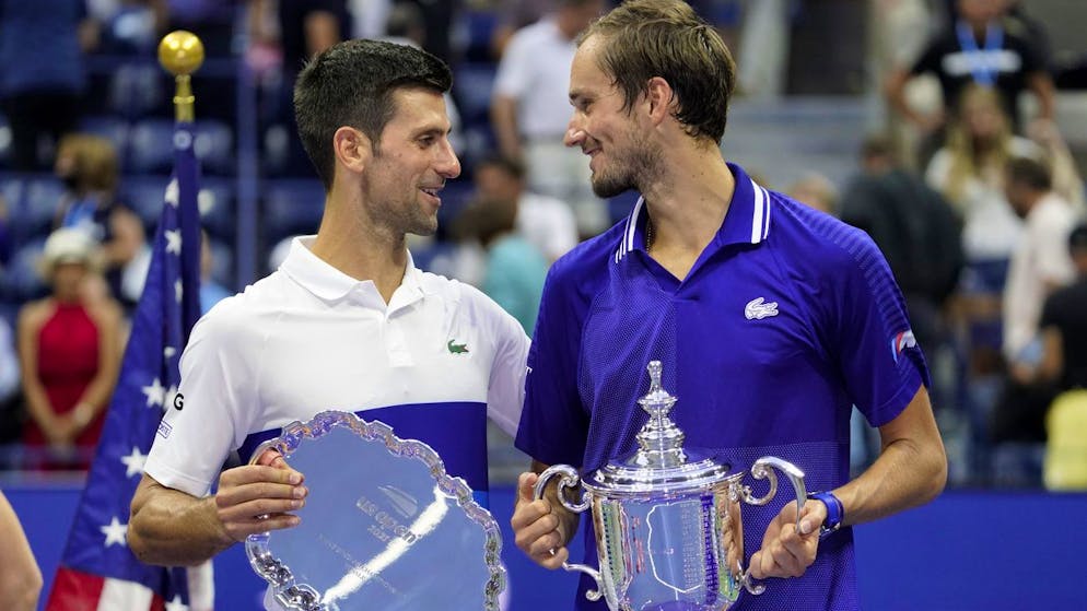 Novak Djokovic, of Serbia, left, and Daniil Medvedev, of Russia, talk during the trophy ceremony after the men's singles final of the US Open tennis championships, Sunday, Sept. 12, 2021, in New York. (AP Photo/John Minchillo)