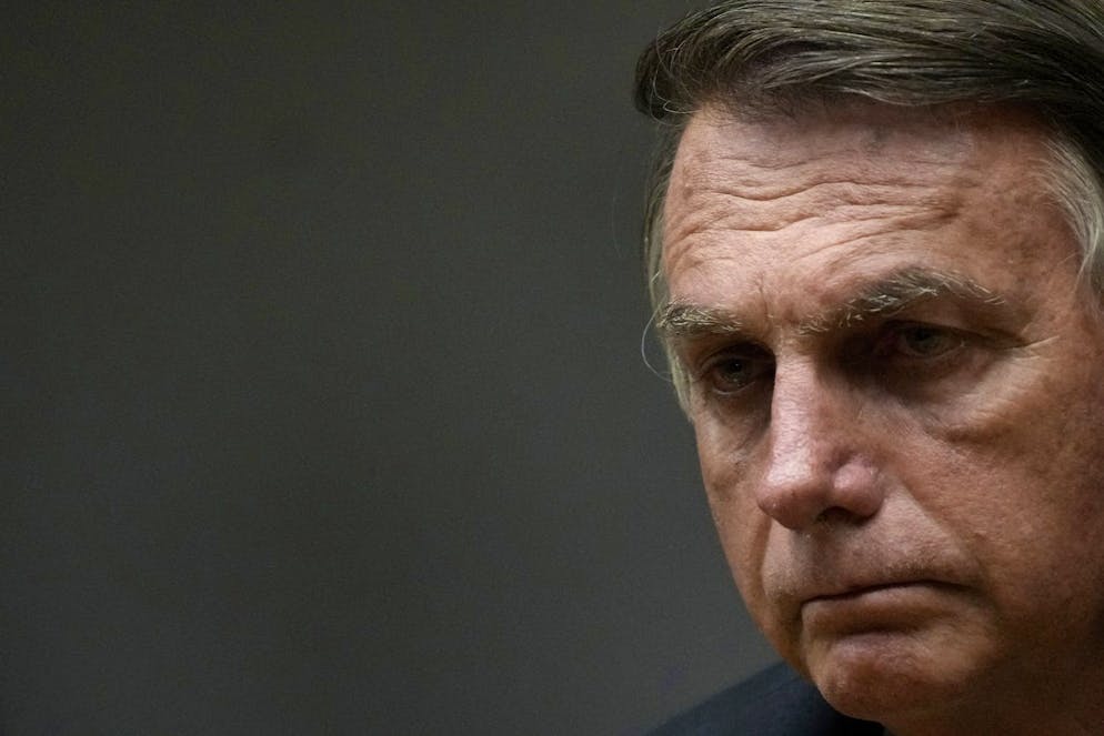Brazil's President Jair Bolsonaro attends a speech at the Ministry of Economy, in Brasilia, Brazil, Friday, Oct. 22, 2021. (AP Photo/Eraldo Peres)