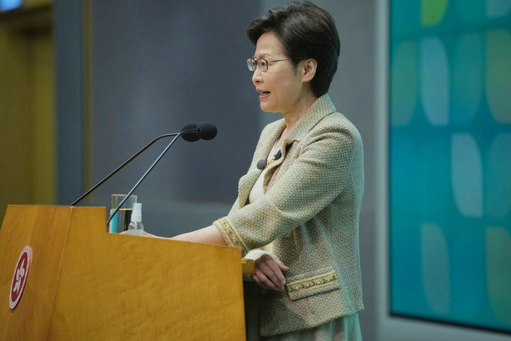 Hong Kong Chief Executive Carrie Lam wearing an arm brace after suffering fracture from fall at home, speaks during a press conference in Hong Kong, Tuesday, Oct. 26, 2021. Hong Kong will tighten COVID-19 restrictions despite a lack of local outbreaks to better align with ChinaâÄ™s policies and increase chances of quarantine-free travel between the territory and mainland, Lam said. (AP Photo/Kin Cheung)