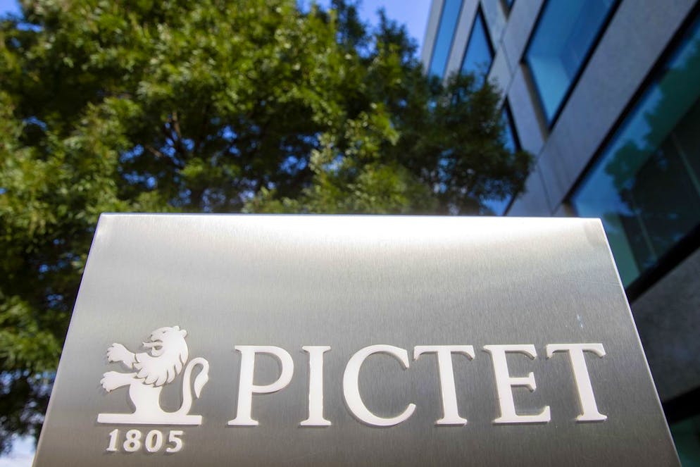 The headquarters building and logo of the private bank Pictet is pictured, in Geneva, Switzerland, Wednesday, October 14, 2020. Pictet & Cie, founded in 1805 at Geneva, is a Swiss bank, and it is specialized on independent asset managemen. (KEYSTONE/Salvatore Di Nolfi)