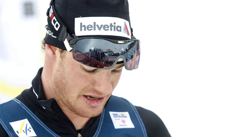 Dario Cologna of Switzerland leaves the finish area after the men's 15 km Individual Classic Cross Country competition at the FIS Nordic Skiing World Championships at the Holmenkollen in Oslo, Norway, Tuesday, March 1, 2011. (KEYSTONE/Peter Klaunzer)
