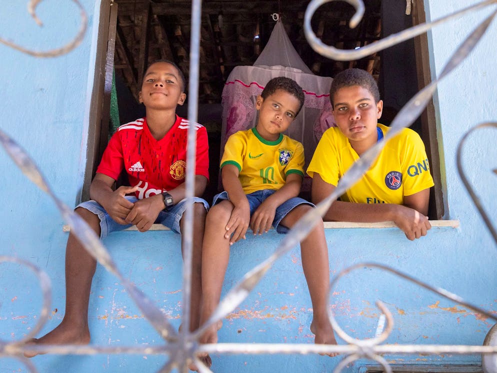 Ilha da Maré. Quilombola community. 

From the left: Emanuel (5), Felipe (13) Gustavo (9) at their home.

Due to the loss of income, the family is experiencing serious difficulties, especially with regard to food, surviving on the donations.
