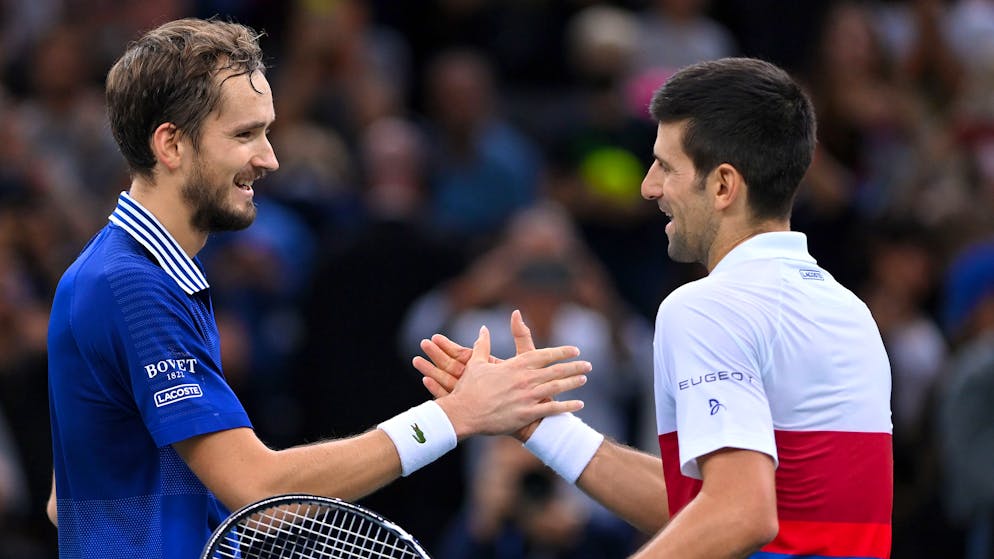 PARIS, FRANCE - NOVEMBER 07: Novak Djokovic of Serbia shakes hands at the net after winning the mens singles final against Daniil Medvedev of Russia on day seven of the Rolex Paris Masters at AccorHotels Arena on November 07, 2021 in Paris, France. (Photo by Justin Setterfield/Getty Images)