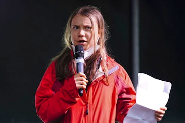 Climate activist Greta Thunberg speaks on the stage after a protest during the Cop26 summit in Glasgow, Scotland, Friday, Nov. 5, 2021. The protest was taking place as leaders and activists from around the world were gathering in Scotland's biggest city for the U.N. climate summit, to lay out their vision for addressing the common challenge of global warming. (Jane Barlow/PA via AP)
