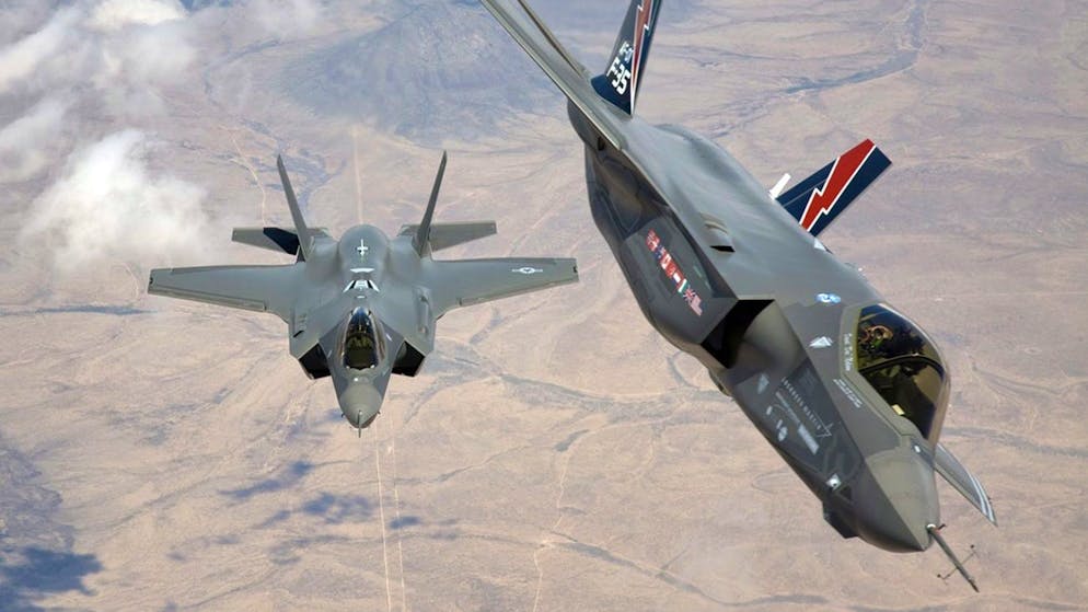 epa03673797 A undated Lockheed Martin Aeronautics handout image made available by Lockeed Martin showing F-35 AF-1 and AF-2 upon their arrival at Edwards Air Force Base, USA. Lockheed Martin 23 April 2013 reported first quarter 2013 net sales of 11.1 billion USD compared to 11.3 billion USD in the first quarter of 2012. Net earnings in the first quarter of 2013 were 761 million USD, or 2.33 USD per diluted share, compared to 668 million USD, or 2.03 USD per diluted share, in the first quarter of 2012. Cash from operations in the first quarter of 2013 was 2.1 billion USD compared to cash from operations of 458 million USD in the first quarter of 2012. EPA/TOM REYNOLDS / HANDOUT HANDOUT EDITORIAL USE ONLY/NO SALES *** Local Caption *** 02263075
