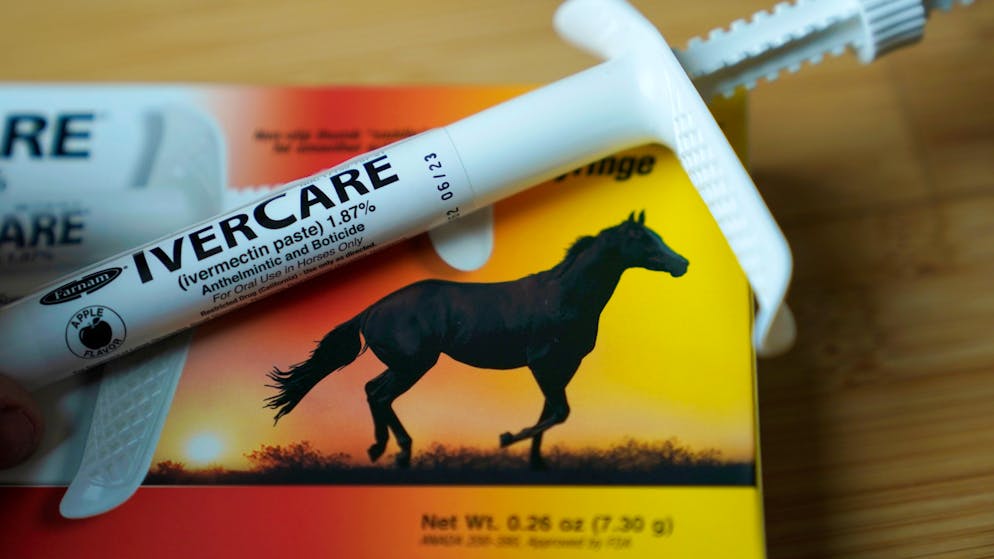 A syringe of of ivermectin — a drug used to kill worms and other parasites — intended for use in horses only, rests on the box it was packaged in, Friday, Sept. 10, 2021, in Olympia, Wash. Health experts and medical groups are pushing to stamp out the growing use of the parasite drug to treat COVID-19, warning that it can cause harmful side effects and that there's little evidence it helps. (AP Photo/Ted S. Warren)
