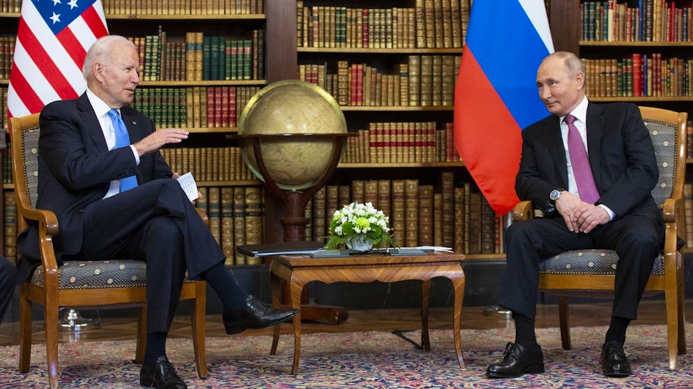 US President Joe Biden, left, and Russian President Vladimir Putin during their meeting at the US - Russia summit in the library of the Villa La Grange, in Geneva, Switzerland, Wednesday, June 16, 2021. (Swiss Federal Office of Foreign Affairs/Peter Klaunzer)
