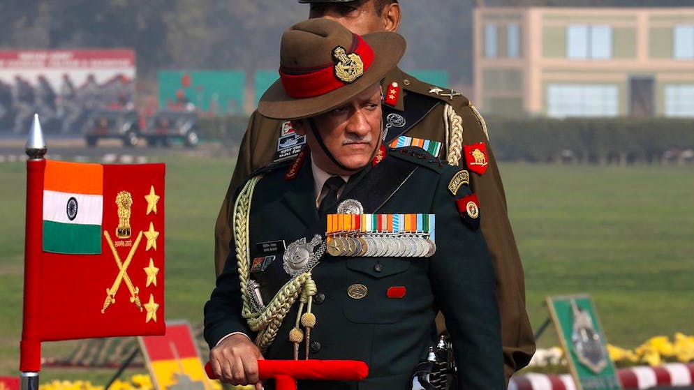epa09628999 FILE Indian Army Chief General Bipin Rawat inspects the Guard of Honor during a function celebrating the Indian Army Day in New Delhi, India, 15 January 2018 (reissued 08 December 20210). According to Indian Air Force on 08 December 2021, General Bipin Rawat was killed in the crash of a helicopter in Southern India earlier the same day. EPA/RAJAT GUPTA *** Local Caption *** 54011556