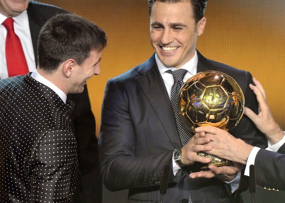 Fabio Cannavaro, lauréat du ballon d'or en 2006, ici sept ans plus tard avec un certain... Léo Messi.