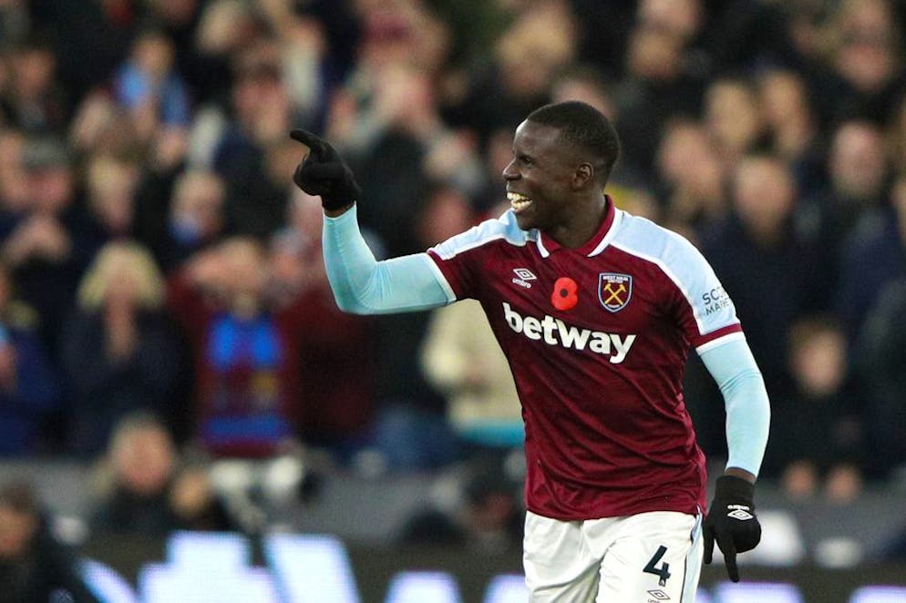 West Ham's Kurt Zouma celebrates after scoring his side's 3rd goal during the English Premier League soccer match between West Ham United and Liverpool at the London stadium in London, England, Sunday, Nov. 7, 2021. (AP Photo/Ian Walton)