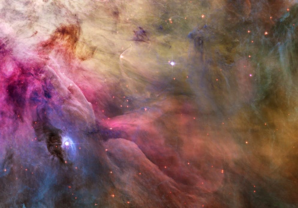 epa03569091 An undated handout image provided by NASA on 05 February 2013 shows a view of cosmic clouds and stellar winds featuring LL Orionis, interacting with the Orion Nebula flow, as NASA describes. Adrift in Orion's stellar nursery and still in its formative years, variable star LL Orionis produces a wind more energetic than the wind from our own middle-aged Sun. As the fast stellar wind runs into slow moving gas a shock front is formed, analogous to the bow wave of a boat moving through water or a plane traveling at supersonic speed. The small, arcing, structure just above and left of center is LL Ori's cosmic bow shock, measuring about half a light-year across. The slower gas is flowing away from the Orion Nebula's hot central star cluster, the Trapezium, located off the upper left corner of the picture. In three dimensions, LL Ori's wrap-around shock front is shaped like a bowl that appears brightest when viewed along the 'bottom' edge. The picture is part of a large mosaic view of the complex stellar nursery in Orion, filled with a myriad of fluid shapes associated with star formation. EPA/NASA/ESA/Hubble Heritage Team/HANDOUT MANDATORY CREDIT: NASA/ESA/HUBBLE HERITAGE TEAM HANDOUT EDITORIAL USE ONLY