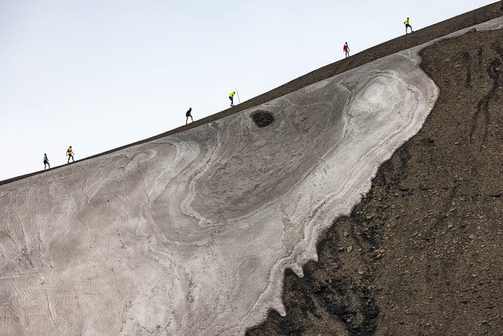 DIVERS Les participants courent sur le glacier de Tsanfleuron à l'approche de la ligne d'arrivée de la course Glacier 3000 au-dessus de la station alpine des Diablerets, en Suisse, le samedi 7 août 2021.