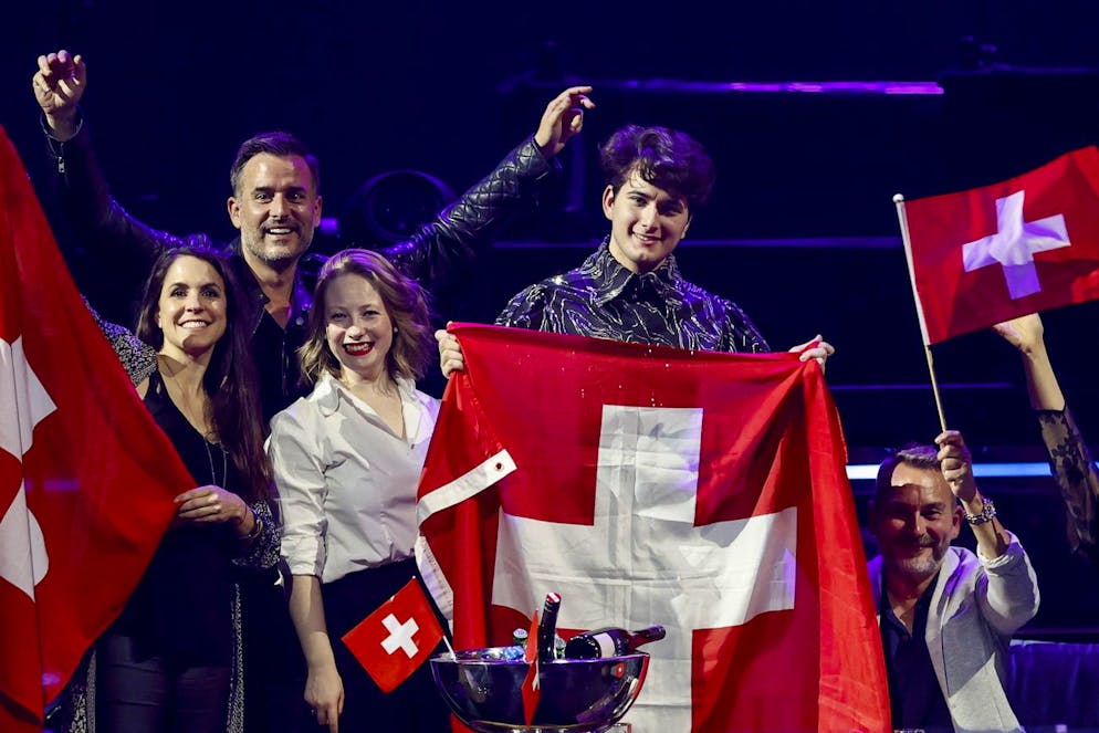 epa09216351 Gjon's Tears from Switzerland celebrate after qualifying for the final during the Second Semi-Final of the 65th annual Eurovision Song Contest (ESC) at the Rotterdam Ahoy arena, in Rotterdam, The Netherlands, 20 May 2021. Due to the coronavirus (COVID-19) pandemic, only a limited number of visitors is allowed at the 65th edition of the Eurovision Song Contest (ESC2021) that is taking place in an adapted form and consist of two semi-finals, on 18 and 20 May, and a grand final on 22 May. EPA/ROBIN VAN LONKHUIJSEN *** Local Caption *** 50359766