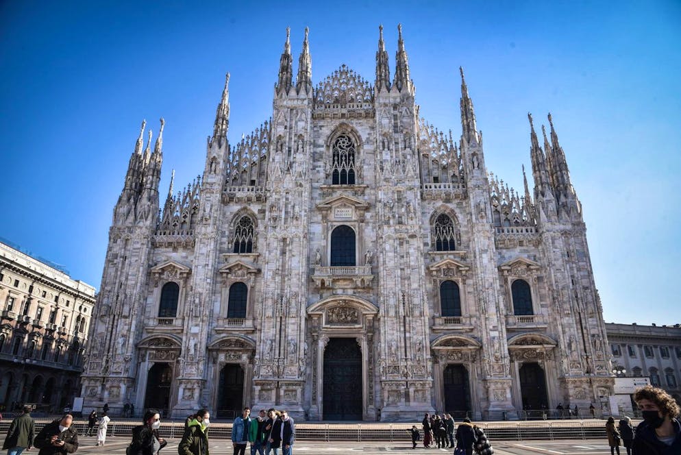 epa09003894 An exterior view of the 'Duomo di Milano', the famous cathedral in Milan, Italy, 11 February 2021. The cathedral, that has been closed for the public in November 2020 within the measures to curb the spread of the COVID-19 pandemic, was reopened on 11 February after some three month with the public able to visit the landmark cathedral on weekdays between 10 am and 05 pm. The Archaeological area and the Terraces will also be open again on weekdays from 10 am to 18 pm. EPA/MATTEO CORNER