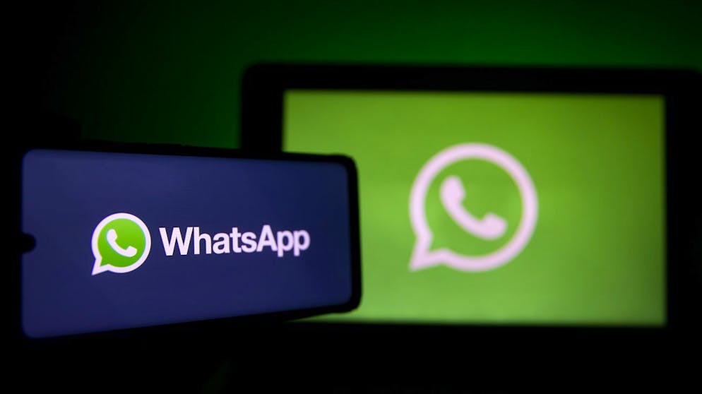 epa08967944 A photo illustration shows the logo of social media messaging application Whatsapp on a computer and a mobile telephone screen, in Paris, France, 27 January 2021. The popular application (app) Whatsapp has faced backlash after announcing on 04 January a change to its privacy policy under which users widely interpreted that personal information would be shared with the app's parent company, Facebook. Although the policy change allegedly was only to affect interactions with business accounts, it prompted millions of users to migrate to rival messaging applications such as Signal and Telegram. EPA/IAN LANGSDON