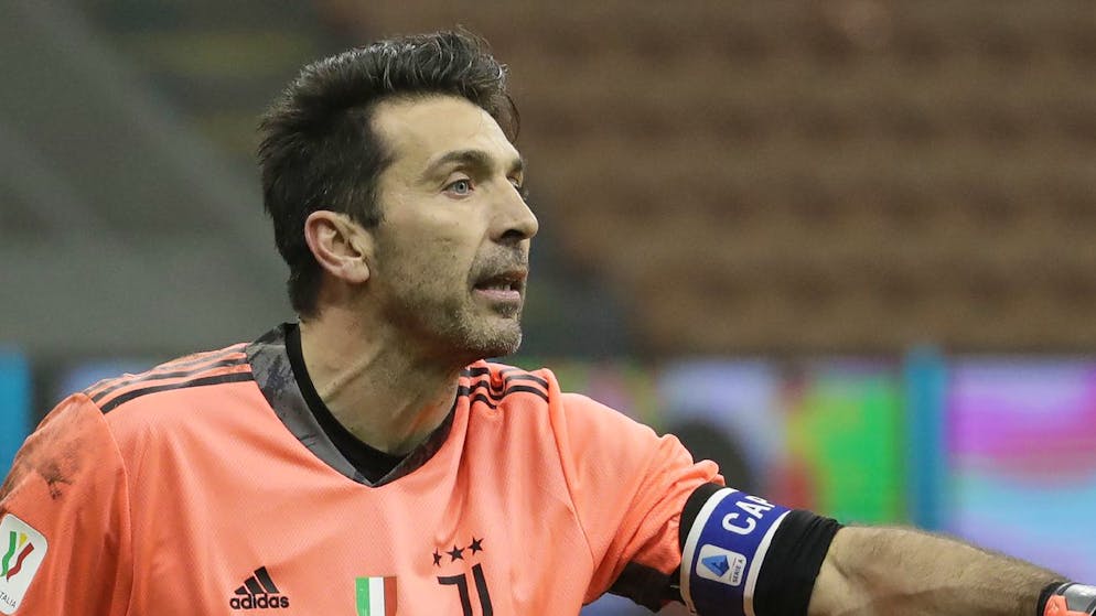 Juventus' goalkeeper Gianluigi Buffon gestures during an Italian Cup round of 4 first round soccer match between Inter Milan and Juventus at the San Siro stadium, in Milan, Italy, Tuesday, Feb.2, 2021. (AP Photo/Luca Bruno)