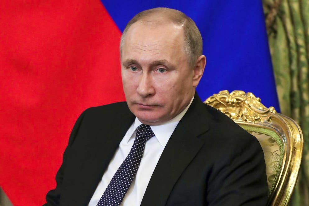 Russian President Vladimir Putin listens to Japanese Prime Minister Shinzo Abe during their meeting in the Kremlin in Moscow, Russia, Thursday, April 27, 2017. Abe visits Moscow on Thursday to meet with President Putin and pursue talks on joint economic projects aimed at a possible breakthrough in their decades-old island dispute. (Mikhail Klimentyev, Sputnik, Kremlin Pool Photo via AP)