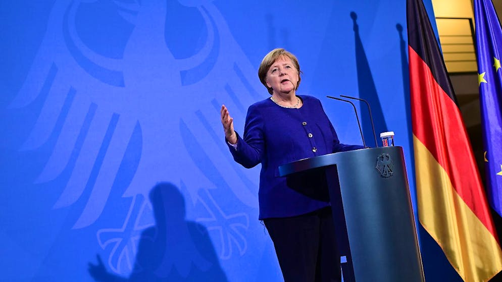 Bundeskanzlerin Angela Merkel (CDU) spricht nach dem EU-Sondergipfel zur Corona-Pandemie auf einer Pressekonferenz. Foto: John Macdougall/AFP Pool/dpa
