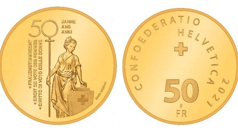 Die Bildseite der goldenen Gedenkmünze zeigt eine Helvetia mit Stimmzettel an der Urne.