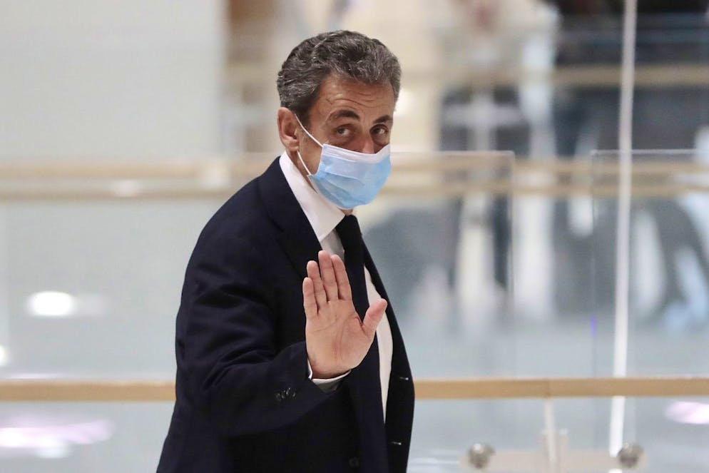 epa08837361 Former French president Nicolas Sarkozy leaves the courtroom during his trial on corruption charges in the so-called 'wiretapping affair' in Paris, France, 23 November 2020. The trial has been suspended until 26 November 2020. In 2013, Nicolas Sarkozy was using a false name, Paul Bismuth, to make phone calls to call his lawyer, Thierry Herzog, about the decision that the Court of Cassation was about to take regarding the seizure of presidential diaries in a separate case. The trial is due to run from 23 November to 10 December. EPA/CHRISTOPHE PETIT TESSON *** Local Caption *** 55512057