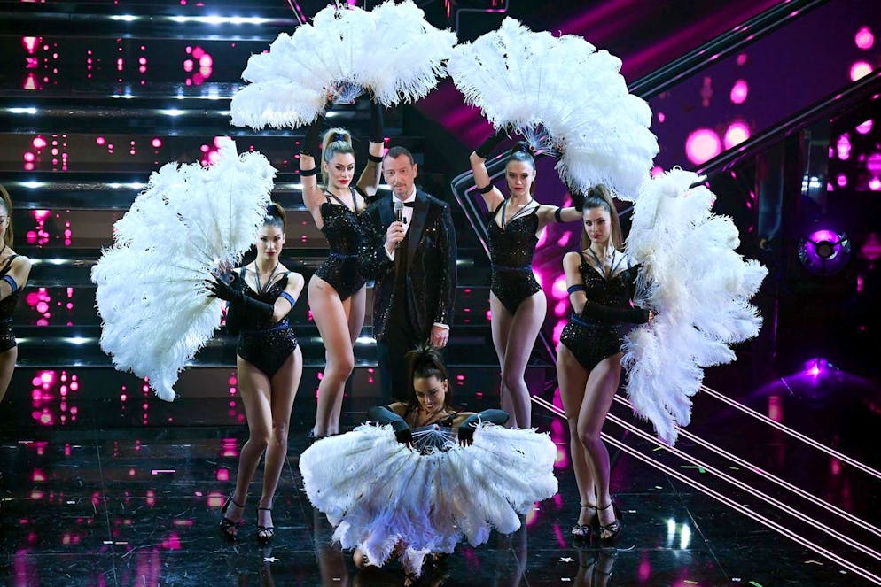 epa09047409 Sanremo Festival host and artistic director Amadeus (C) is surrounded by dancers on the stage of the Ariston Theatre during the 71st Sanremo Italian Song Festival, in Sanremo, Italy, 02 March 2021. The festival runs from 02 to 06 March 2021. EPA/ETTORE FERRARI