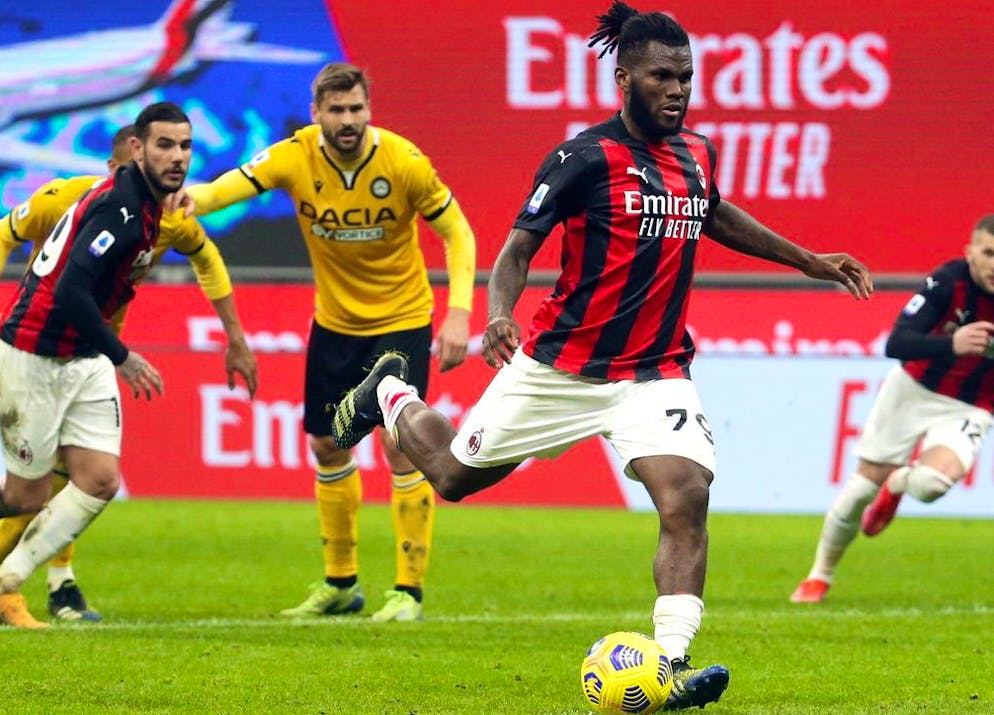 epa09050127 AC Milan's Franck Kessie scores a penalty goal during the Italian Serie A soccer match between AC Milan and Udinese at Giuseppe Meazza stadium in Milan, Italy, 03 March 2021. EPA/MATTEO BAZZI