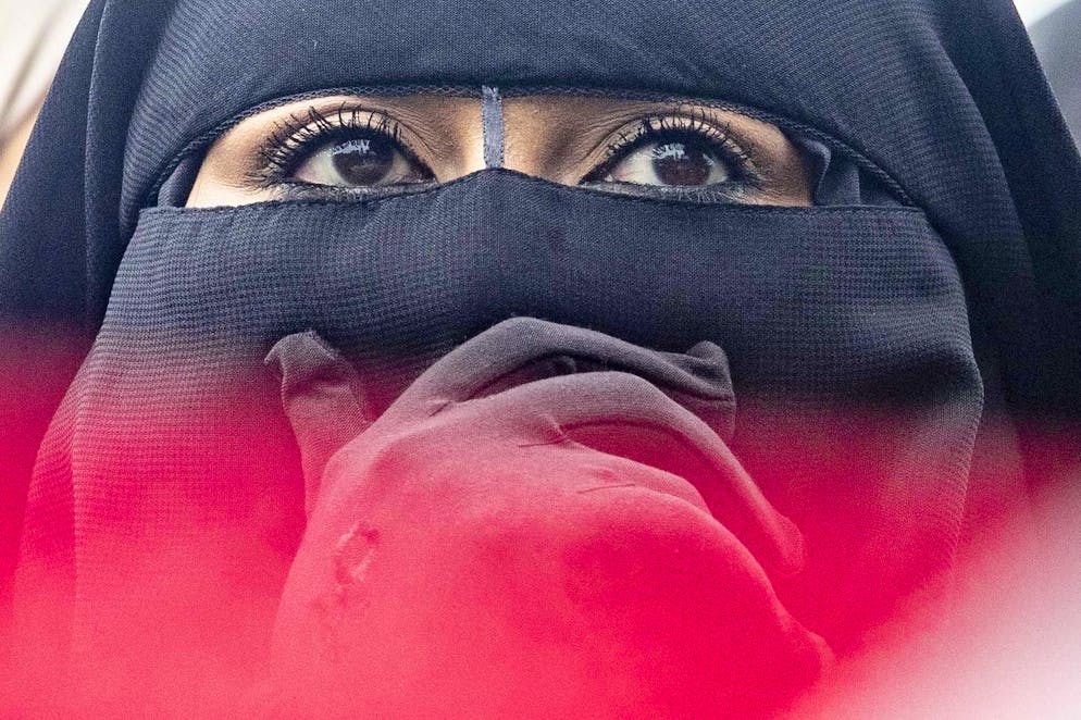 epa07764251 A protester wearing a niqab demonstrates against the burqa ban in The Hague, Netherlands, 09 August 2019. During the campaign, niqabs comparable to burqas were distributed. Dutch burqa ban came into force on 01 August 2019. The Netherlands joins a number of other European nations in implementing the controversial law. EPA/NIELS WENSTEDT