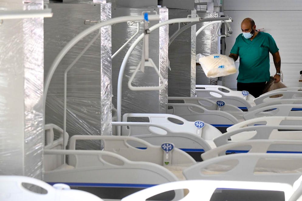 epa08854600 An inside view of a marquee with 16 beds that has been set up at the Cardarelli hospital during the second wave of the Covid-19 Coronavirus pandemic, in Naples, Italy, 01 December 2020. The new facility will host patients arriving at the Emergency Room congested by Covid cases. EPA/CIRO FUSCO